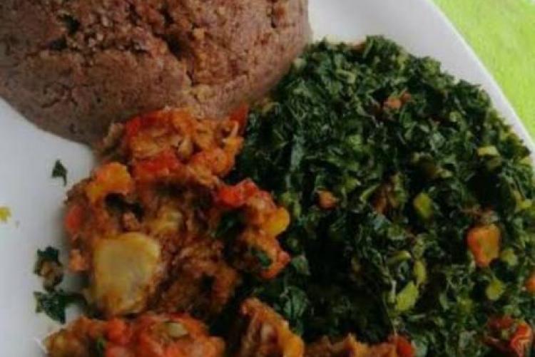 Fried beef with brown ugali and kales in coconut sauce